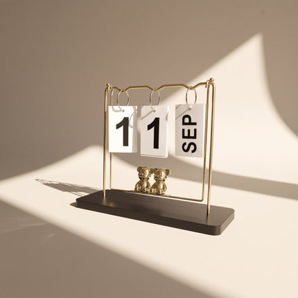 Gold Perpetual Calendar with Bear Figurines