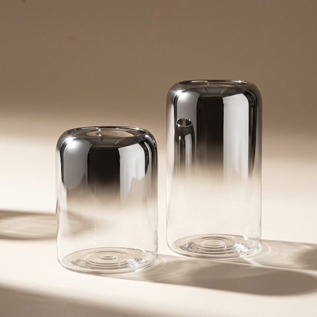 Smoky Cylinder Pair — two silver-fade glass cylinder vases